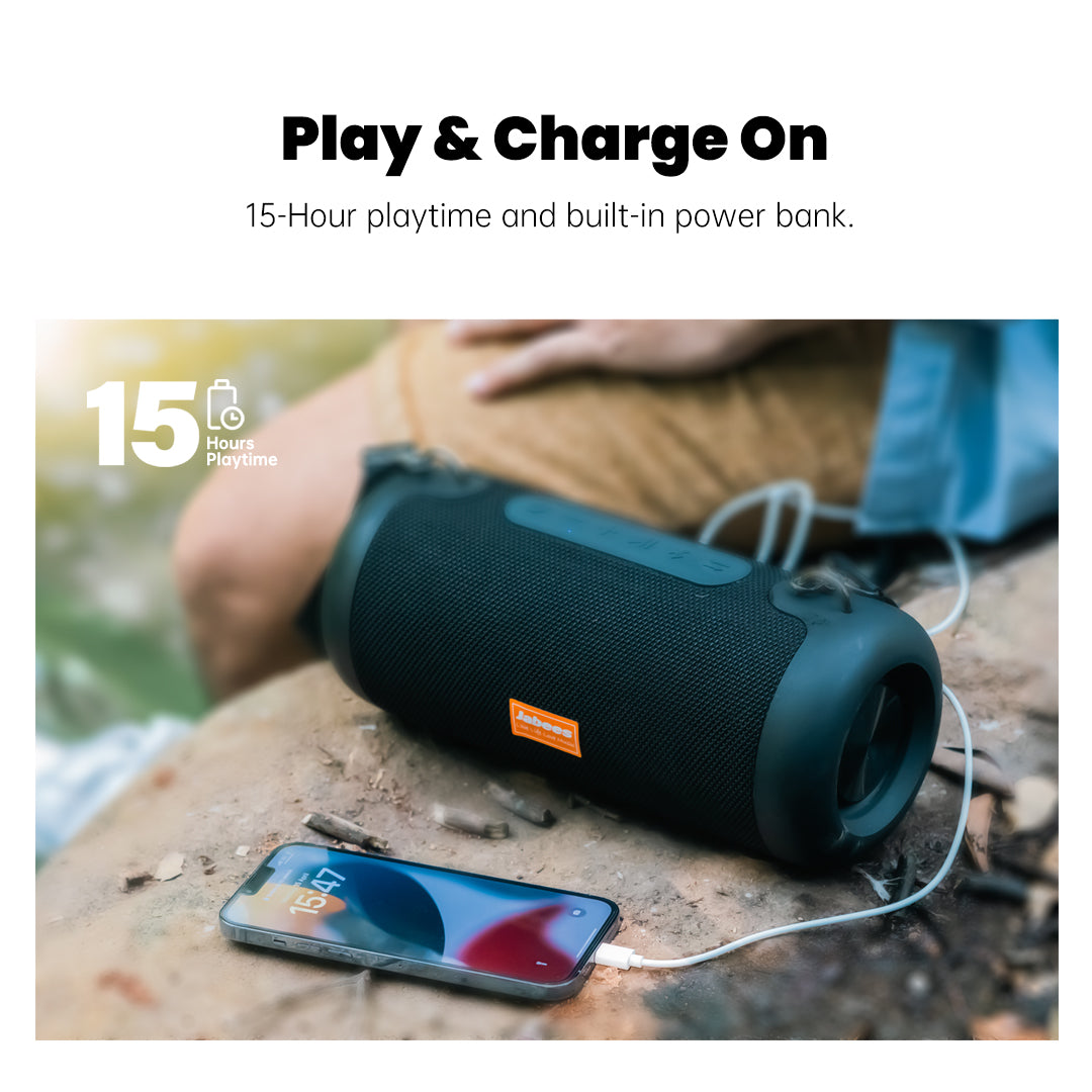 Portable speaker with smartphone charging cable and text about playtime and power bank on a natural background