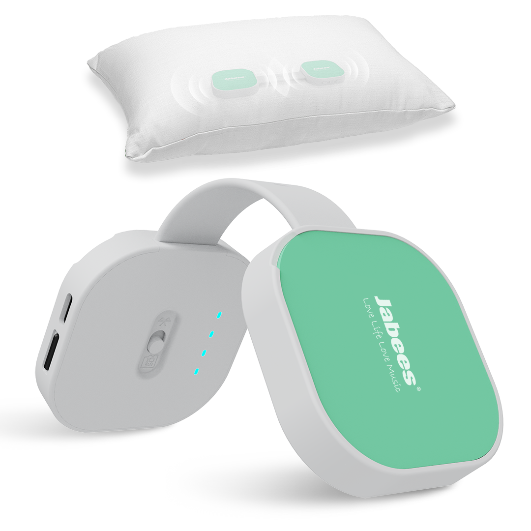 A Jabees smart sleep pillow accessory set featuring a white headband-style sleep mask with a mint green face and a white pillow with two mint green sensors, shown on a clean white background.