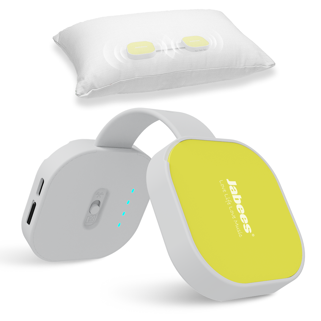 A Jabees wireless ear plug shown with its white silicone case and a white pillow above it, both on a clean white background. The case features a bright yellow-green front face with the Jabees brand logo.