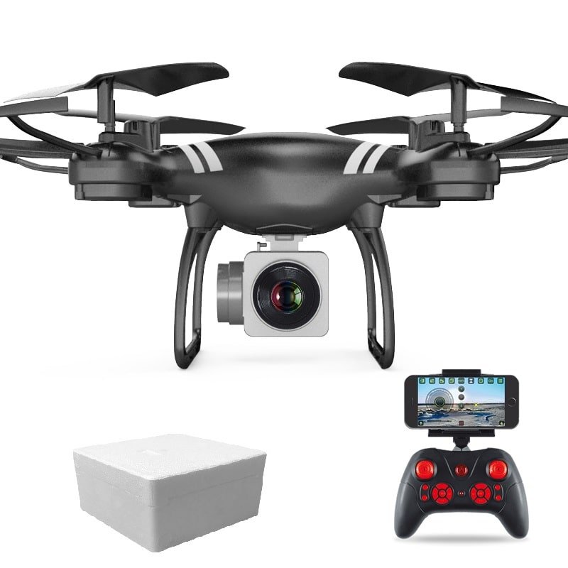 Black drone with camera, remote control, and box on a white background